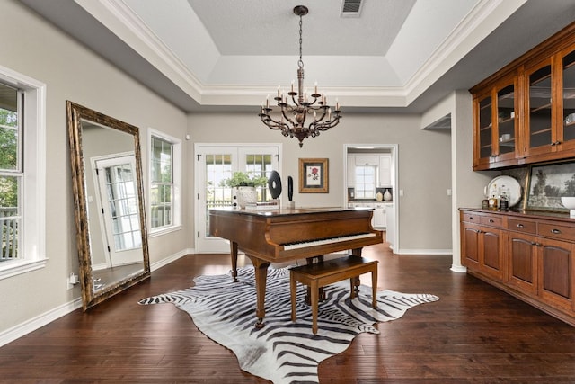 5710 Carry Back Ln, Austin, TX 78746 - living area featuring a chandelier, plenty of natural light, dark wood-style floors, and crown molding
