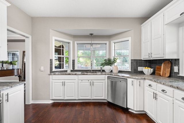 5710 Carry Back Ln, Austin, TX 78746 - kitchen with dishwasher, a sink, dark wood-style floors, and decorative backsplash