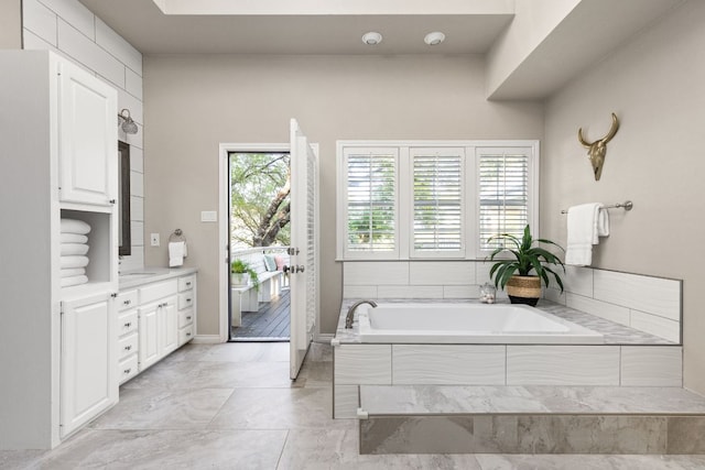 5710 Carry Back Ln, Austin, TX 78746 - bathroom with vanity and a garden tub