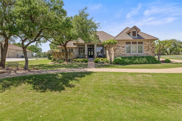 27435 Waterfall Hill Pkwy, Spicewood, TX 78669 - view of front of home with a front lawn