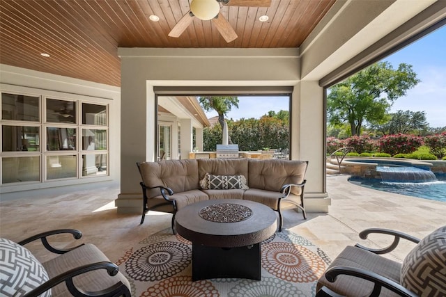 27435 Waterfall Hill Pkwy, Spicewood, TX 78669 - view of patio / terrace with an outdoor pool, exterior kitchen, ceiling fan, an in ground hot tub, and outdoor lounge area