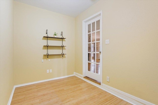 2203 Nathan Dr, Austin, TX 78728 - spare room with wood finished floors and baseboards