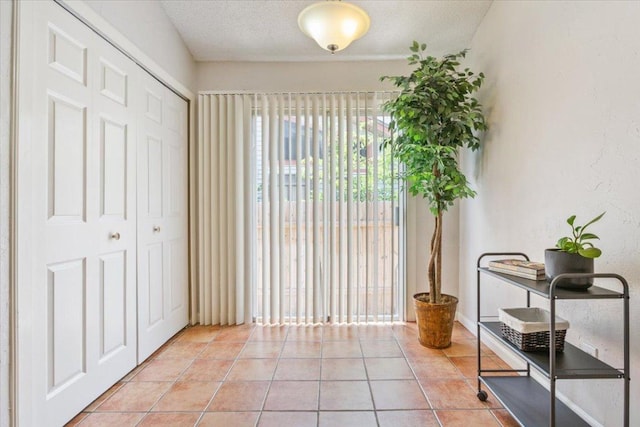 2203 Nathan Dr, Austin, TX 78728 - foyer entrance with light tile patterned floors