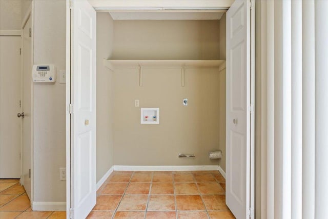 2203 Nathan Dr, Austin, TX 78728 - laundry room with hookup for a washing machine and light tile patterned floors