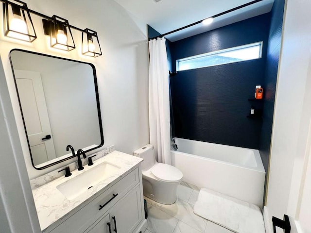 bathroom featuring toilet, vanity, and shower / bath combo with shower curtain