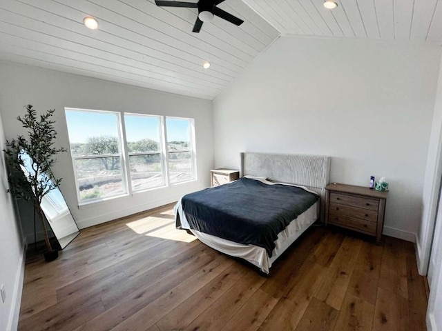 bedroom featuring lofted ceiling, hardwood / wood-style flooring, recessed lighting, and a ceiling fan