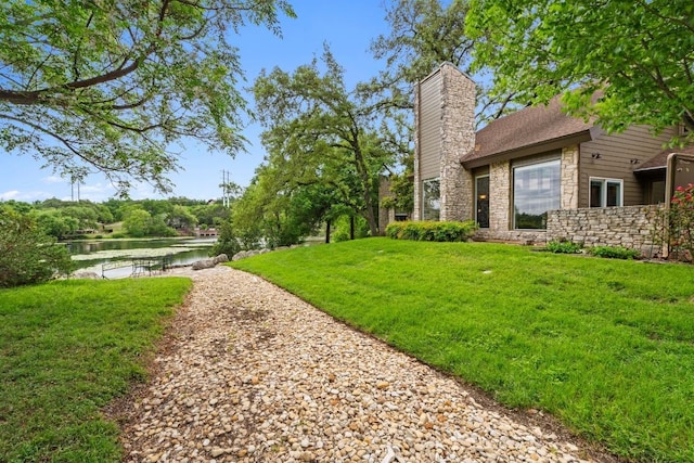 9 Stoney Creek Cv, Lakeway, TX 78734 - view of grassy yard featuring a water view