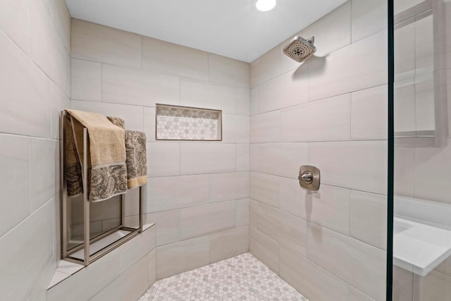 9 Stoney Creek Cv, Lakeway, TX 78734 - bathroom featuring a tile shower