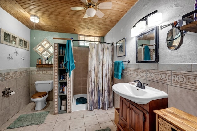 bathroom with tile patterned floors, tile walls, wood ceiling, ceiling fan, and toilet