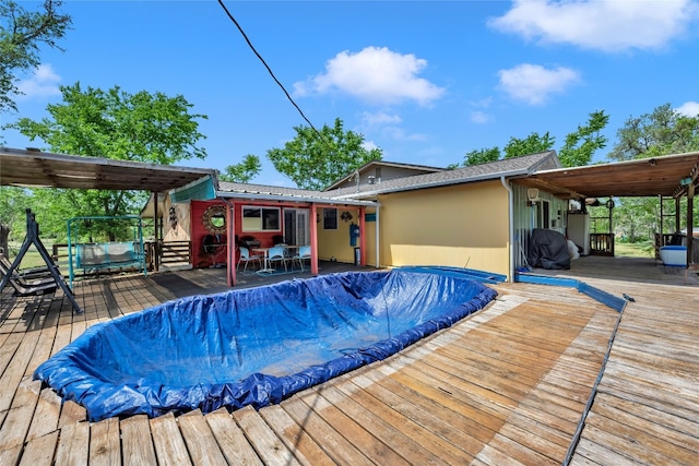 view of pool with a deck