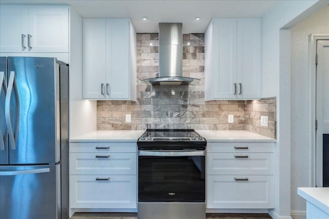 219 Quarry Ln, Liberty Hill, TX 78642 - kitchen with white cabinets, stainless steel appliances, light countertops, wall chimney exhaust hood, and tasteful backsplash
