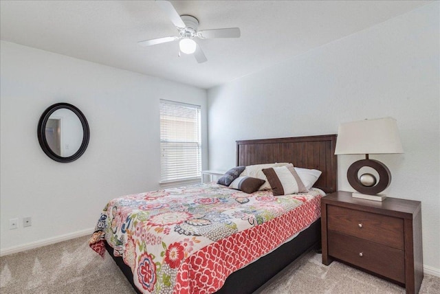 219 Quarry Ln, Liberty Hill, TX 78642 - bedroom with light carpet, a ceiling fan, and baseboards
