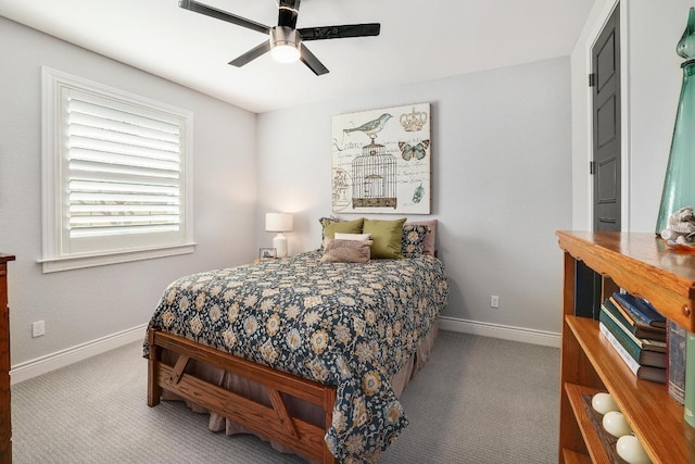 bedroom featuring baseboards, carpet flooring, and ceiling fan