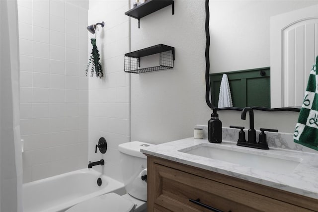 full bathroom with tub / shower combination, toilet, and vanity