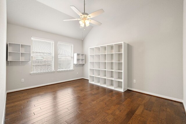 spare room featuring lofted ceiling, a ceiling fan, baseboards, and hardwood / wood-style flooring