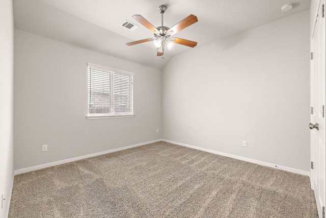 carpeted empty room featuring ceiling fan, baseboards, and visible vents