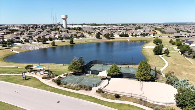 aerial view with a residential view and a water view