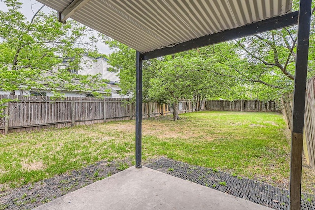 view of yard with a fenced backyard and a patio area
