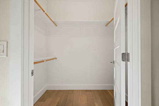 4709 Bandera Rd, Austin, TX 78721 - walk in closet featuring light wood-style flooring