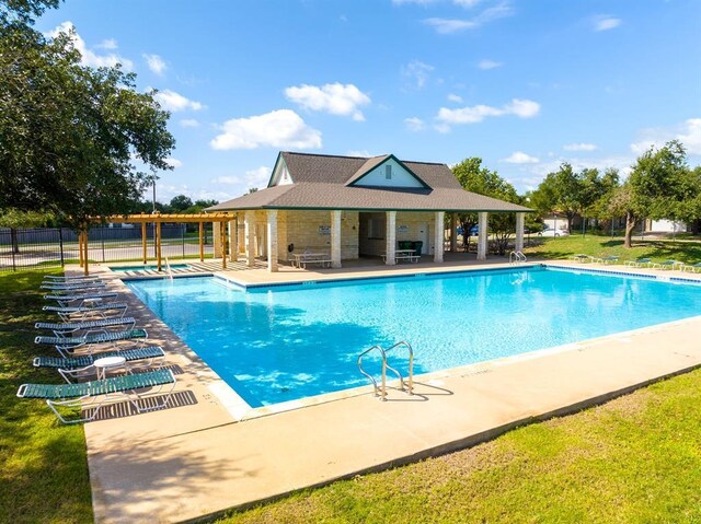 17320 Manish Dr, Pflugerville, TX 78660 - community pool with fence and a patio area
