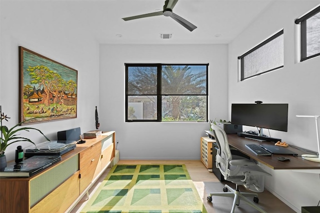 30 Chalmers Ave, Austin, TX 78702 - office space featuring healthy amount of natural light, light wood-type flooring, and ceiling fan