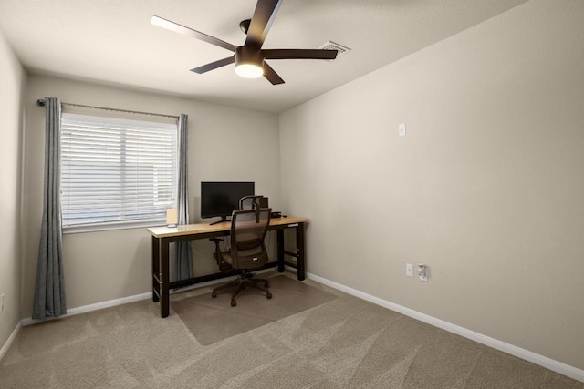 604 Nueces River Trl, Hutto, TX 78634 - carpeted home office with ceiling fan, baseboards, and visible vents