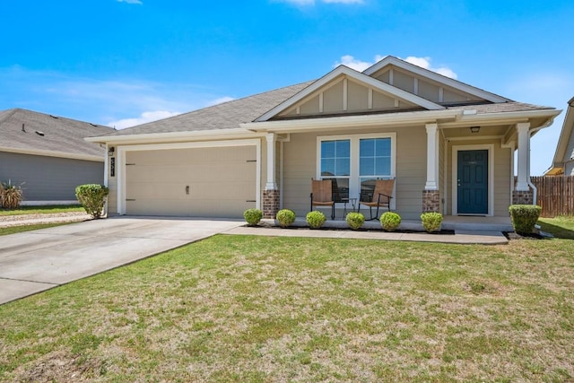 604 Nueces River Trl, Hutto, TX 78634 - craftsman-style home with a garage, covered porch, and concrete driveway
