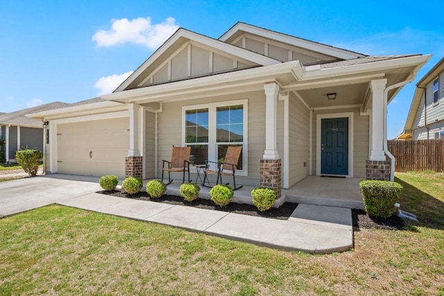 604 Nueces River Trl, Hutto, TX 78634 - craftsman-style house featuring driveway, board and batten siding, an attached garage, fence, and a porch