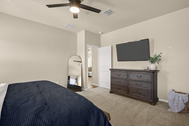 604 Nueces River Trl, Hutto, TX 78634 - bedroom featuring light colored carpet, baseboards, and ceiling fan