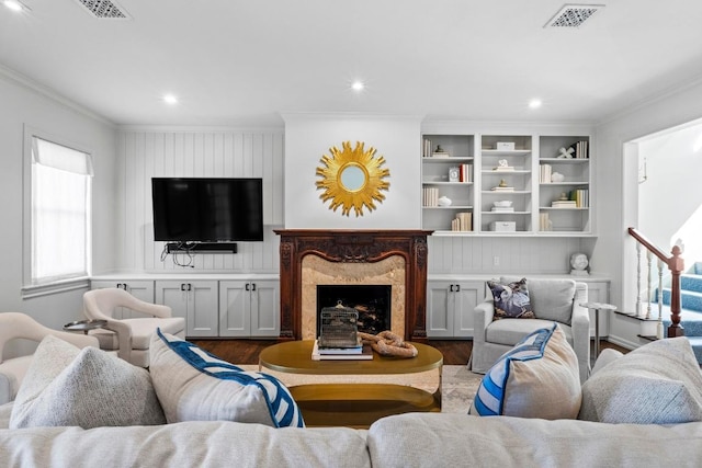 2702 Hillview Green Ln, Austin, TX 78703 - living area featuring crown molding, dark wood-type flooring, recessed lighting, and a high end fireplace