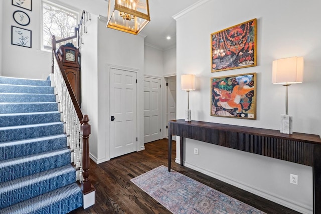2702 Hillview Green Ln, Austin, TX 78703 - foyer featuring ornamental molding, stairway, a chandelier, wood finished floors, and recessed lighting