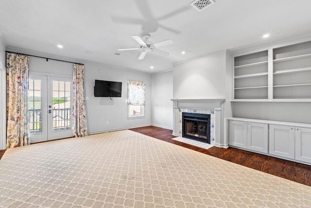 2702 Hillview Green Ln, Austin, TX 78703 - unfurnished living room with ceiling fan, wood finished floors, plenty of natural light, a fireplace with flush hearth, and recessed lighting