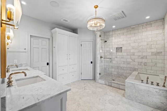 2702 Hillview Green Ln, Austin, TX 78703 - bathroom with double vanity, a shower stall, a bath, a chandelier, and a closet