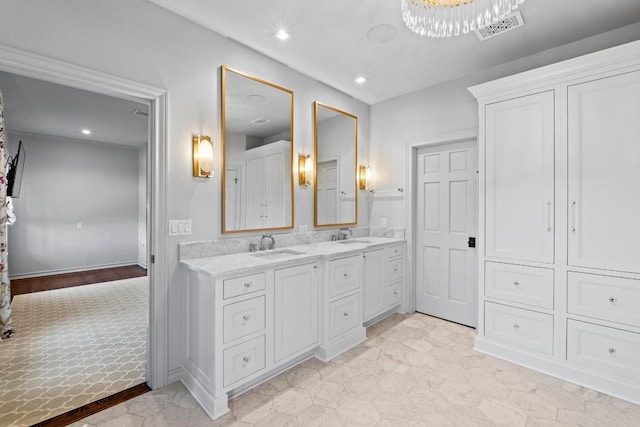 2702 Hillview Green Ln, Austin, TX 78703 - bathroom with double vanity, recessed lighting, and a chandelier