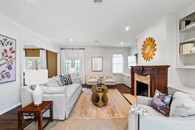 2702 Hillview Green Ln, Austin, TX 78703 - living room featuring wood finished floors, a high end fireplace, recessed lighting, and ornamental molding