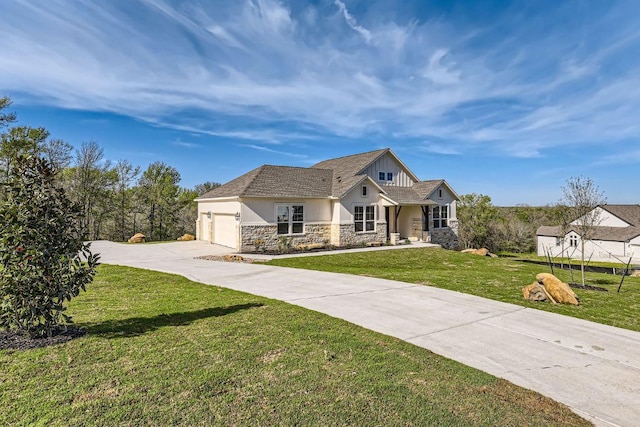 craftsman-style home with driveway, stone siding, a front yard, a garage, and stucco siding