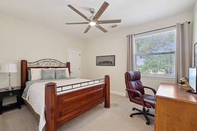 1900 Val Verde Dr, Austin, TX 78732 - bedroom featuring baseboards, visible vents, light colored carpet, and ceiling fan