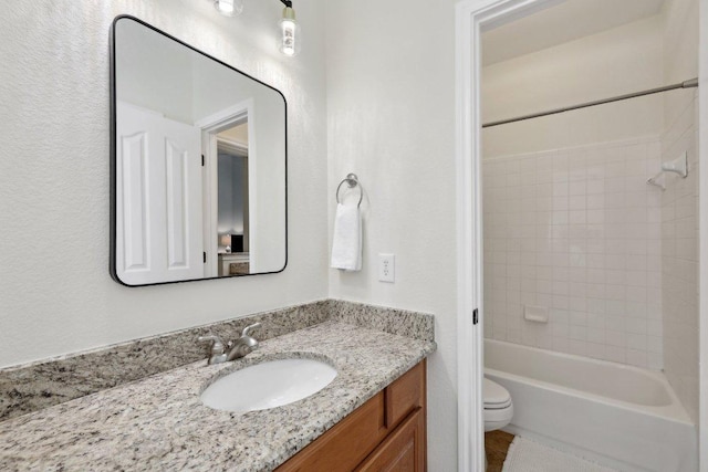 1900 Val Verde Dr, Austin, TX 78732 - bathroom featuring tile patterned flooring, toilet, vanity, and  shower combination