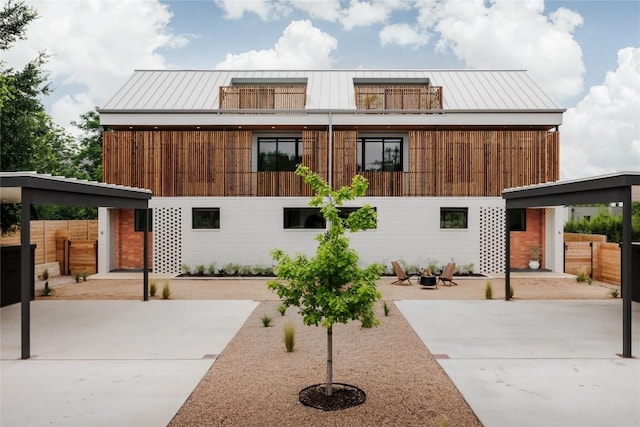 303 W Elizabeth St Unit A, Austin, TX 78704 - contemporary home featuring a standing seam roof and a metal roof
