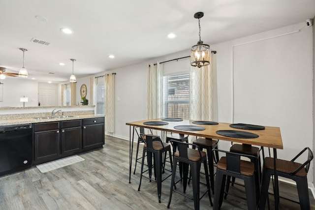 153 Proclamation Ave, Liberty Hill, TX 78642 - dining area with recessed lighting, light wood-style flooring, and visible vents