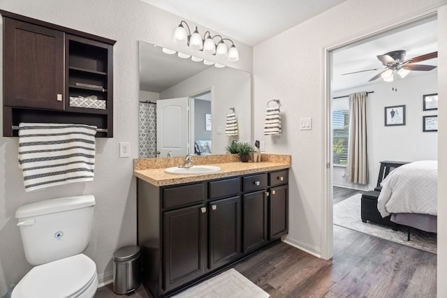 153 Proclamation Ave, Liberty Hill, TX 78642 - bathroom with ensuite bath, wood finished floors, and baseboards