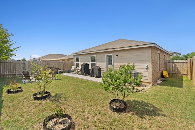 153 Proclamation Ave, Liberty Hill, TX 78642 - rear view of property featuring a patio area, a lawn, and a fenced backyard