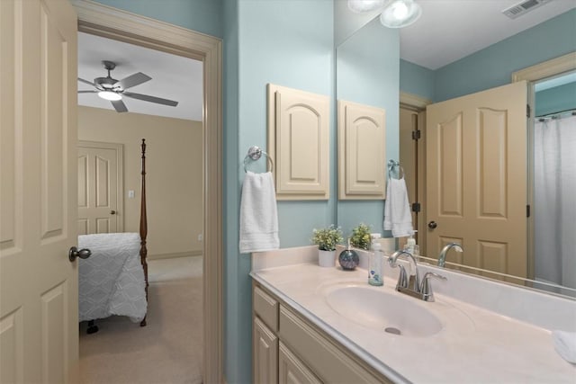 2418 Silent Brook Trl, Round Rock, TX 78665 - bathroom featuring ceiling fan and vanity