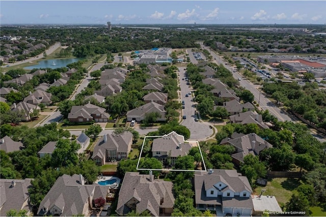 2418 Silent Brook Trl, Round Rock, TX 78665 - aerial view of residential area with property boundaries highlighted and a nearby body of water
