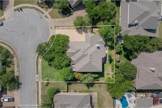 2418 Silent Brook Trl, Round Rock, TX 78665 - aerial view of residential area featuring property parcel outlined and a pool area