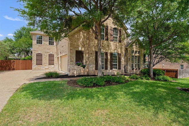 2418 Silent Brook Trl, Round Rock, TX 78665 - view of front of home featuring concrete driveway, brick siding, and stone siding