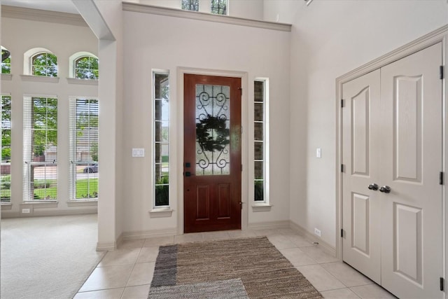 2418 Silent Brook Trl, Round Rock, TX 78665 - entryway featuring light tile patterned floors and baseboards