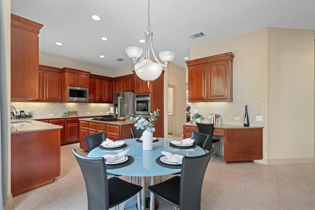 2418 Silent Brook Trl, Round Rock, TX 78665 - dining space featuring light tile patterned floors and recessed lighting