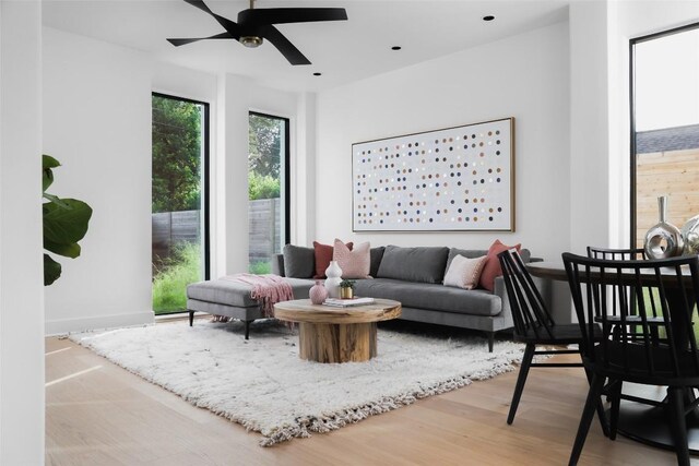 2709 Addison Ave, Austin, TX 78757 - living area featuring wood finished floors and a ceiling fan