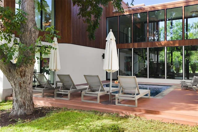 2709 Addison Ave, Austin, TX 78757 - exterior space featuring a wooden deck and a sunroom